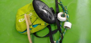 chalk bag with brush and climbing tape